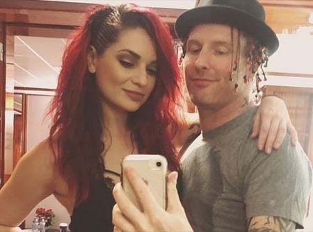 A photo of Corey and his wife.